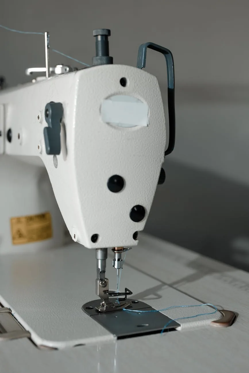 Industrial lockstitch sewing machine head on a factory workbench